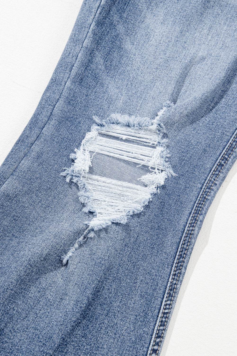 Women's Blue High Rise Ripped Distressed Hem Flared Jeans